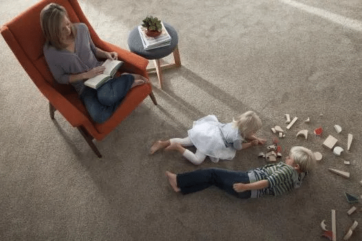Mom with Children on Carpet