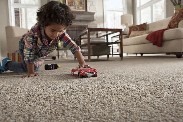 Child Playing on Carpet